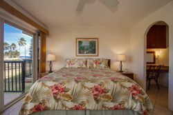 large bedroom with king bed and glass door to lanai - click for larger picture